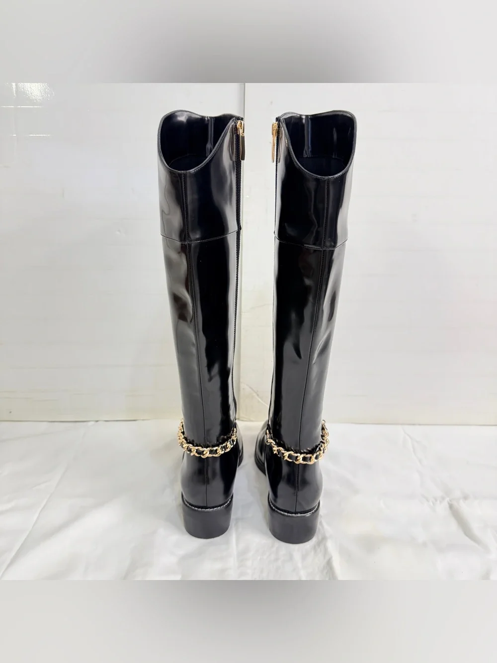 NEW L’Agence Black Patent Knee-High Boots with Gold Chain Accent, Size 7.5